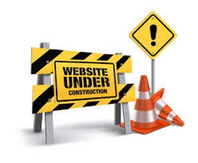 A yellow and black sign next to orange cones

AI-generated content may be incorrect.